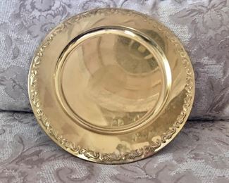 $20 each - 6  Lacquered brass chargers 12" diameter 