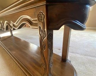 Zoom detail of carving on sofa table