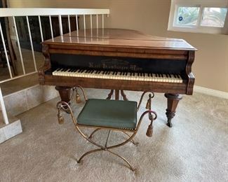 Antique piano.  Walnut, late Victorian. Serial #2884. Plays but soundboard is off. Karl Hamburger. Ivory keys a little discolored.