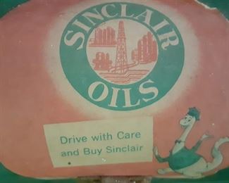 This label was added.  This is NOT a Sinclair advertising piece,  Close up of label on the front the Christmas mail box.  