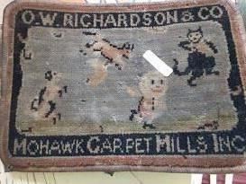 Hook or needlepoint rug advertiser, about a foot in length