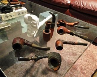 Pipes Indian head $50 the brown pipes $80 for all
