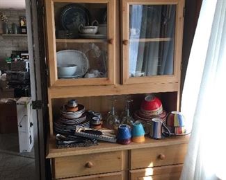 Pine farmhouse cabinet with roasting pans copco vintage bowls dishware 