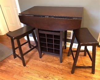 Drop leaf table with wine storage and 2 stools