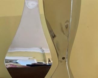 Custom artist-signed stainless steel vases by Michael Aram