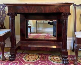 Empire marble-topped side table with carved feet