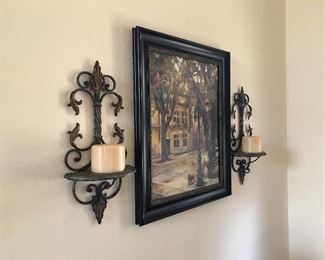 Indoor sconces and framed art pieces 