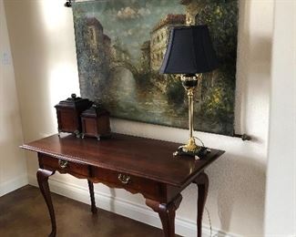 Classic wood entryway table, lamp, box decor, artwork 
