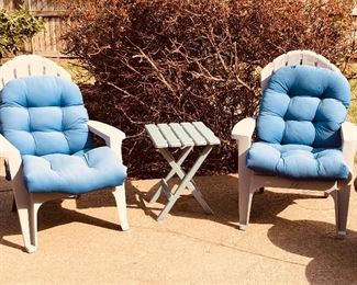 Pair of outdoor chairs, cushions, and outdoor table