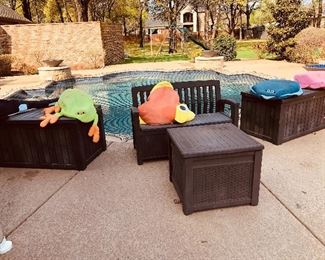 Lots of outdoor storage boxes and outdoor storage bench, various pool toys and large floaties 