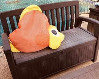 Outdoor storage bench and pool items 
