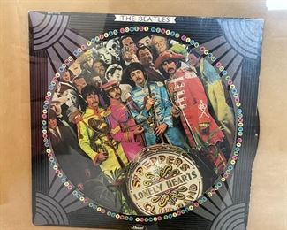 sgt. peppers lonely hearts club band lp record in frame