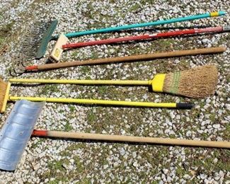 (6) Piece Outdoor Tools Lot, Snow Shovel, Professional Rough Scrub Brush, (2) Brooms, Rake, and Wood Handle Ground Cultivator