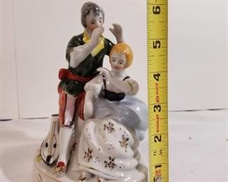 Handpainted Figurine Made in Occupied Japan. Man and Woman and Musical Instrument.