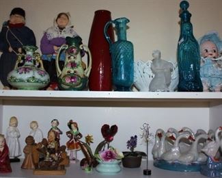 China vase, Dutch dolls, Our Lady Guadalupe Bottle, assorted china and glass antiquities. 