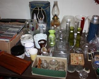 Assorted glass vases, glass furniture coasters, plant frogs, lanterns