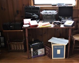 Canon printer, antique typewriters, Canon 8mm motor zoom camera, writing table