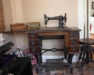 Early 1900's Rotary White treadle sewing machine with table and drawers, antique piano stool and sewing notions