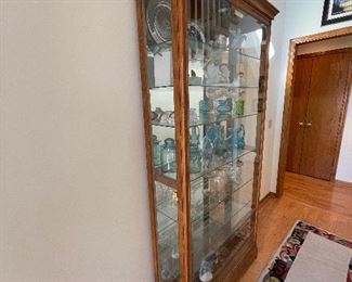 HOWARD MILLER Locking “Collector’s Cabinet”