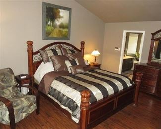 California King Headboard Cherry Wood with iron accents, foot board, comforter, pillows. King Mattress and Spring NOT included.