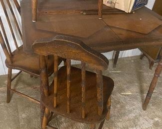 Vintage drop leaf table and three chairs with lovely stencil on backs of chairs and table top 