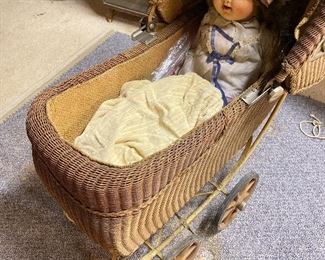 Wicker buggy and baby