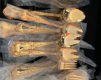 Golden Versailles  Gold Flatware. 8 place settings plus hostess serving set $75 set. ( in wrappers in box)