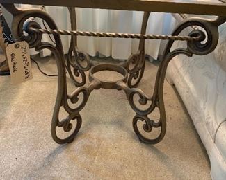 24" by 23" by 25"Ornate  metal  table with glass top $100