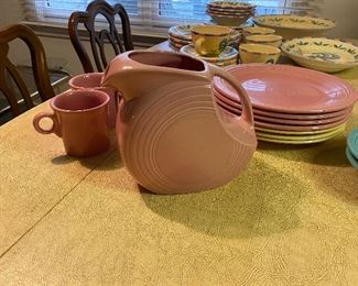 Vintage Pink Fiestaware pitcher $30,   Plates $10 each 