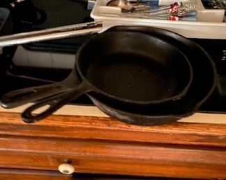 Cast iron pans large $12 small $8