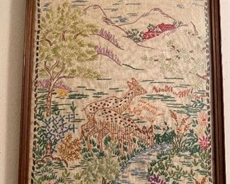 Framed needlework of deer