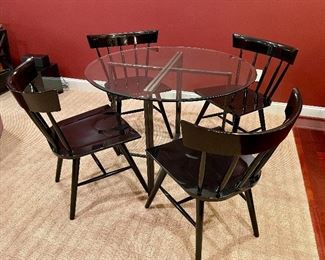 Mitchell Gold iron base table with glass top and 4 black lacquer chairs 