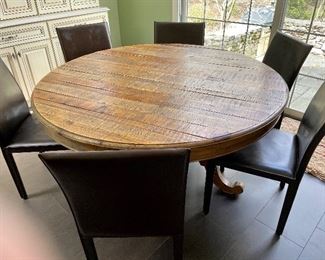 Arhaus furniture round farm table and 6  leather chairs by Maria Yee Inc