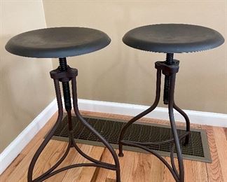2 metal swivel stools