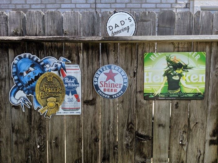 A variety of metal beer signs!
