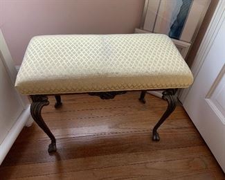 Upholstered bench with cast brass cabriole legs. Made by WH Howell - 25” x 13” x 18” 