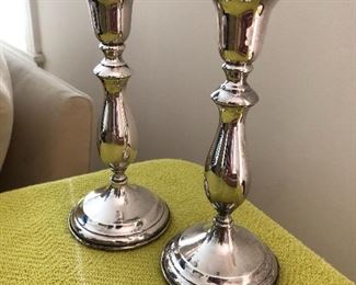 Weighted sterling silver candleholders.....