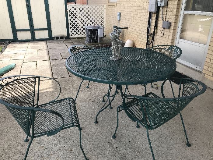 Wrought iron outdoor table with 4 chairs