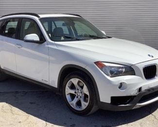 VIN WBAVM1C58EVW52055 - Year: 2014 - Make: BMW - Model: X1 - Trim Level: S Drive 28i - Engine Type: 2.0L - Transmission: Automatic - Miles: TMU - Speedometer INOP - Color: White - Driveline: RWD -Located In: Chattanooga, TN - Operational Status: Runs and Drives - Power Windows  - Power Mirrors  -Power Locks  - Power Seats Vinyl Interior -  Speakers Make a Continuous Clicking Sound -  Dash Lights Will Not Come On *Sold As Is Where Is*