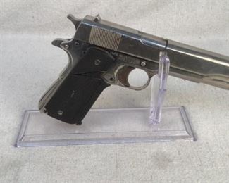 Serial - 972734
Mfg - Remington Rand
Model - US M1911A1 Pistol
Caliber - 45 Auto
Barrel - 5"
Capacity - 7+1
Magazines - 1
Type - Pistol
Located in Chattanooga, TN
Condition - 4 - Aged, Heavy Wear
This lot contains a Remington Rand US M1911A1 pistol that was manufactured between 1942-1943. This pistol's frame is marked FJA indicating this frame was made by Remington Rand/Ithaca and inspected by Col. Frank J. Atwood of the U.S. Army Ordnance production facilities in Rochester, New York. There is also a faint scratching of "Aug. '67" on this pistol, indicating possible use in the Vietnam war. (speculation only)
At some point in this pistol's long life it was stripped to bare metal and refinished with a chrome finish and equipped with Pachmayr grips.

**Dayton PD search and seizure firearm**