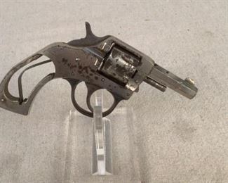 Serial - 4380
Mfg - H&R Arms Co.
Model - Young America Revolver
Caliber - 22 Short
Barrel - 2"
Capacity - 7
Type - Revolver, Double Action
Located in Chattanooga, TN
Condition - 6 - Inoperable, Parts Only
This lot contains a H&R Arms Co. Young America Revolver chambered in 22 Short. This revolver needs some serious TLC and as is, is not in working condition. The double action works, however the cylinder can rotate both ways. This revolver is missing the grip and has some noticeable wear.

**Dayton PD search and seizure firearm**