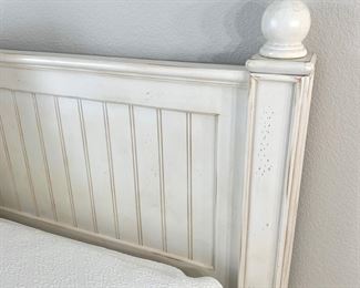 American Signature white distressed queen bed frame with available matching dresser.
