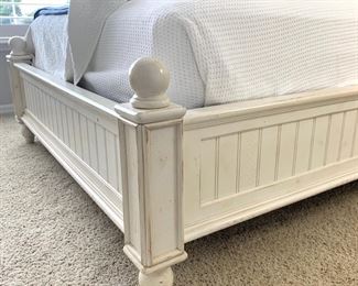 American Signature white distressed queen bed frame with available matching dresser.