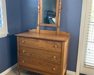 Antique oak dresser w/mirror measures 37" x 18" x 34" Overall height is 63"