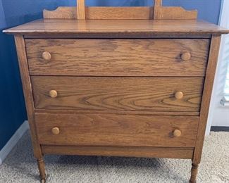 Antique oak dresser w/mirror measures 37" x 18" x 34" Overall height is 63"