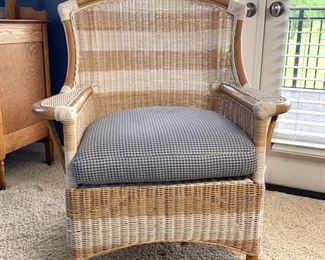 Striped wicker chair with houndstooth seat cushion measures 34" x 30" x 40"