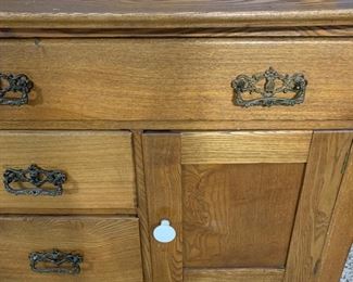 Antique washstand with harp towel bar measures 32" x 16" x 25.5" Overall height is 46"