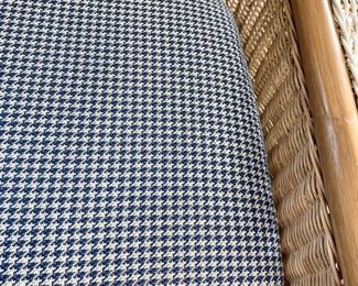 Striped wicker chair with houndstooth seat cushion measures 34" x 30" x 40"