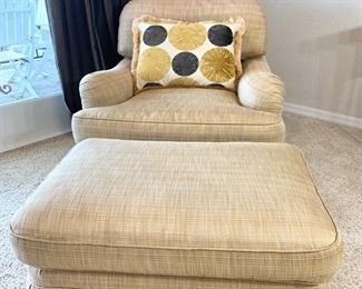 PAIR OF CHAIRS AVAILABLE.                                          Luxury E.J. Victor chair and ottoman upholstered in a pale gold textured fabric. The chair measures 37" x 40" x 36". The ottoman measures 34" x 24" x 17"