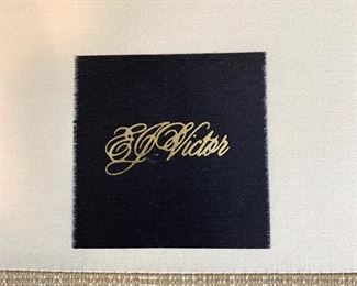 PAIR OF CHAIRS AVAILABLE.                                          Luxury E.J. Victor chair and ottoman upholstered in a pale gold textured fabric. The chair measures 37" x 40" x 36". The ottoman measures 34" x 24" x 17"